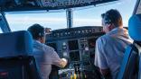 pilots in cockpit