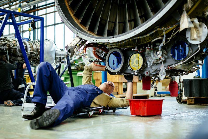 mechanic on jet engine