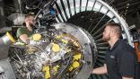 technician working on aircraft engine